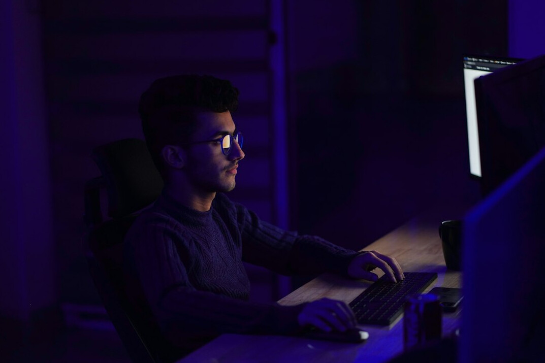 young programmer at desk