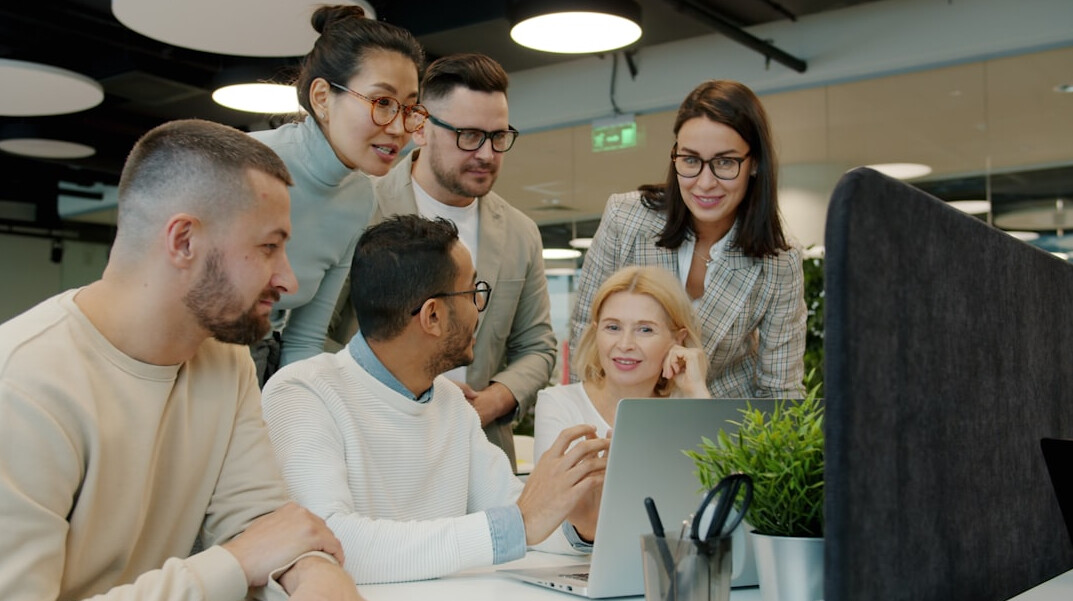 business team reviewing code