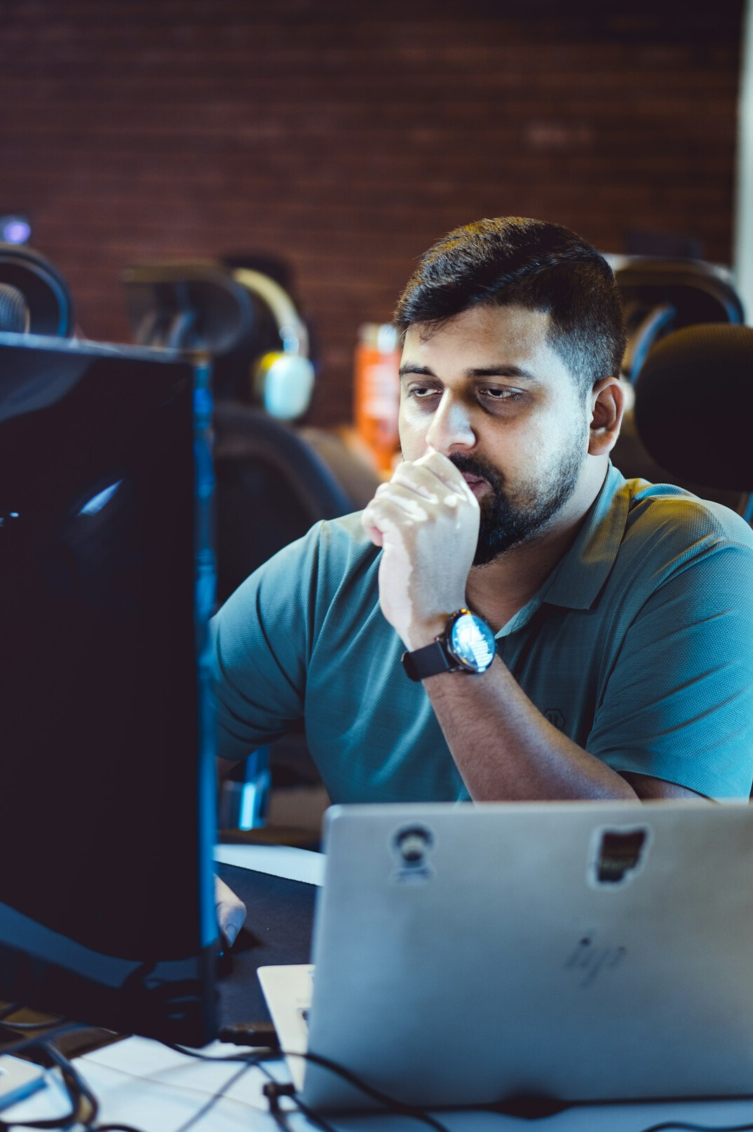 software developer coding at desk